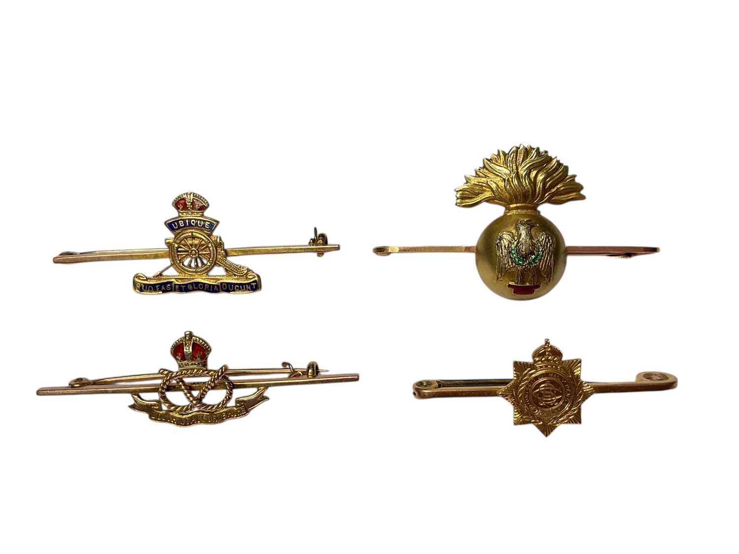 Lot 52 - Four gold military sweetheart brooches