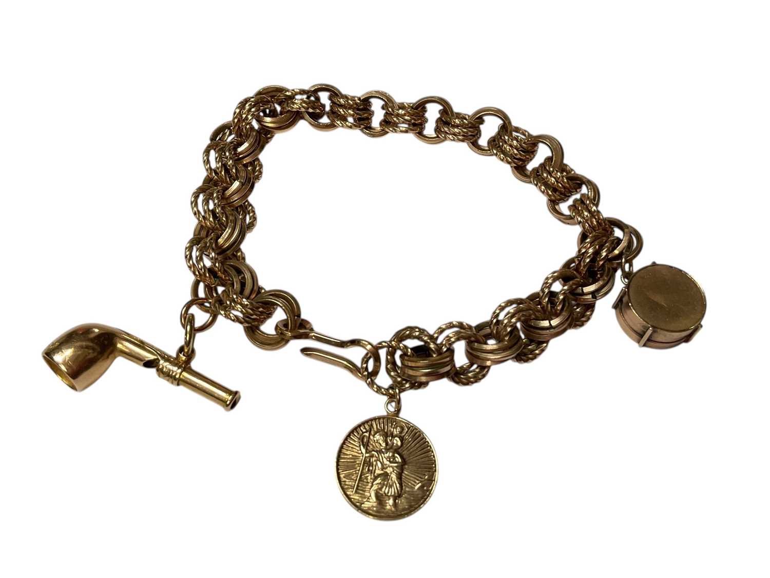 Lot 166 - Gold plated fancy link bracelet with three gold charms