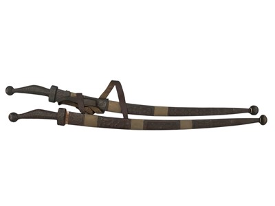 Lot 248 - Two antique African swords