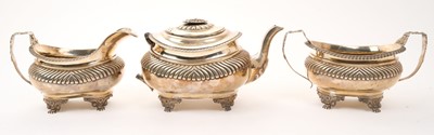 Lot 469 - George III silver three piece tea set