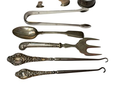 Lot 67 - Two similar silver candlesticks, set of six 1920s silver coffee bean end spoons in fitted case, set of six silver handled butter knives in fitted case, other silver items and flatware