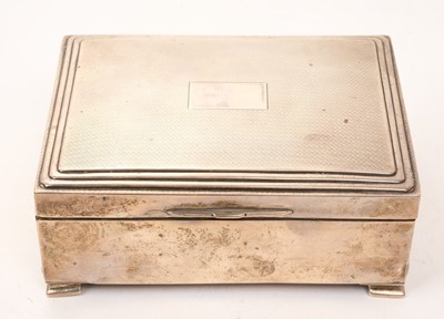 Lot 472 - 1930s silver cigarette box of rectangular form, with engine turned decoration