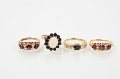 Lot 637 - Four 9ct gold and gem-set rings