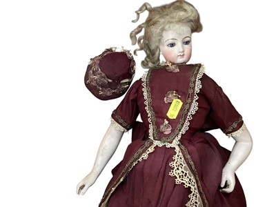 Lot 2726 - 19th century doll with porcelain head and body in period costume.