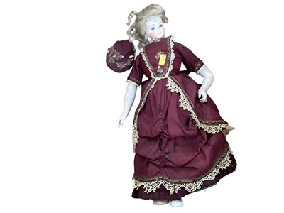 Lot 2726 - 19th century doll with porcelain head and body in period costume.