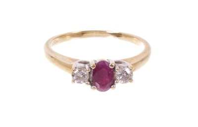 Lot 638 - 9ct gold ruby and diamond three stone ring