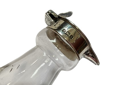 Lot 83 - Edwardian Mappin & Webb silver mounted glass whisky noggin (Birmingham 1910), 11cm high