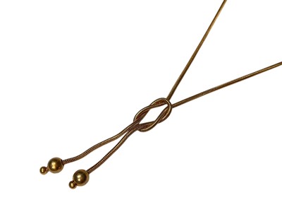 Lot 96 - 9ct gold reef knot necklace with ball end terminals, 44cm long