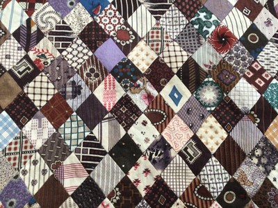 Lot 2126 - Antique Patchwork quilt made up from very small patches mainly printed cotton.