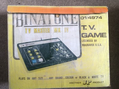 Lot 1997 - 1980's Sony red First Cassette player, Karioke and Walkman. Mario Brothers clock, 1980's Goast Busters backpack and Proton Pack, Binatone TV game boxed, Amiga Manual and other books, Guitar Hero...