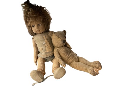 Lot 146 - Early mohair teddy bear and his friend, a doll