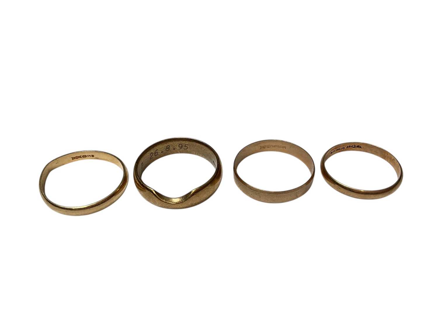 Lot 102 - Four 9ct gold wedding rings