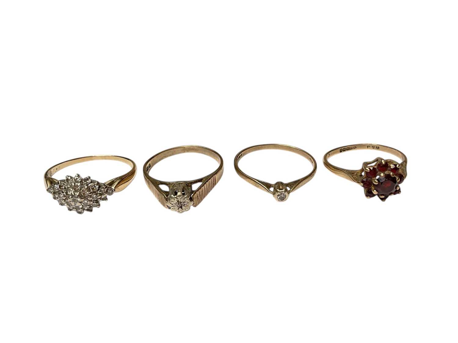 Lot 103 - Diamond cluster ring, two 9ct gold diamond single stone rings and 9ct gold garnet cluster ring (4)