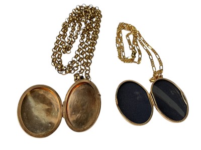 Lot 104 - Two 9ct gold oval locket pendants with engraved decoration, both on 9ct gold chains
