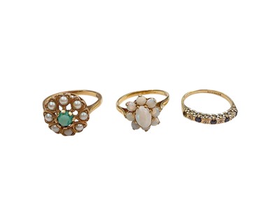 Lot 1187 - 9ct gold turquoise and seed peal flower head cluster ring, 9ct gold opal cluster ring and 9ct gold sapphire and diamond half eternity style ring (3)