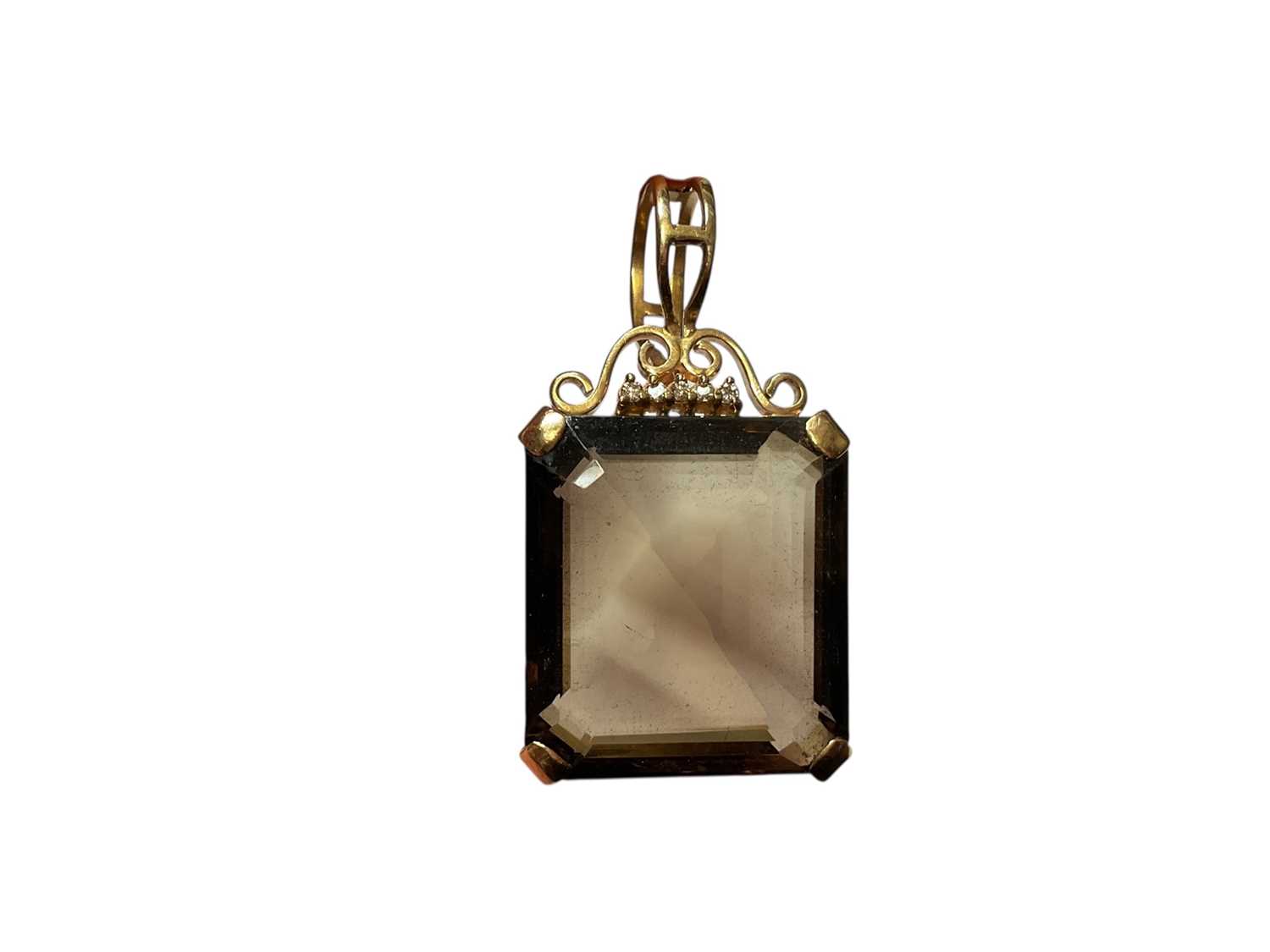 Lot 114 - Large smoky quartz and diamond pendant