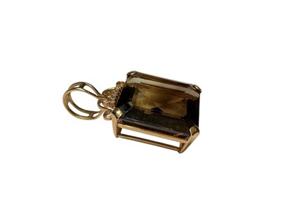 Lot 114 - Large smoky quartz and diamond pendant