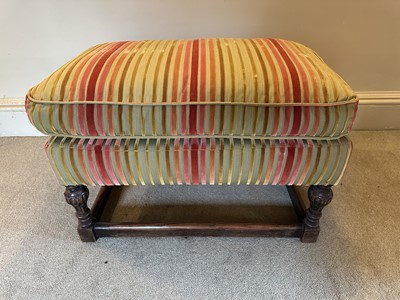 Lot 1249 - Antique oak framed rectangular stool, upholstered in multi stripe fabric, on carved legs joined by stretchers