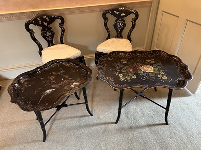 Lot 1268 - Pair of Victorian papier mâché side chairs inlaid with mother of pearl decoration, together with two antique papier mache trays on later bamboo style legs