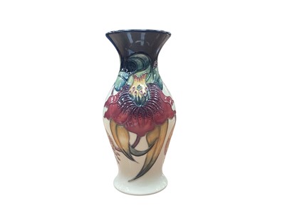 Lot 1009 - Moorcroft pottery vase decorated in the Anna Lily pattern, dated 98, 19.5cm high