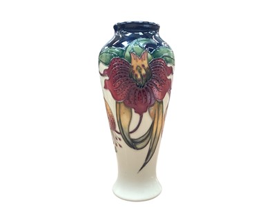 Lot 1010 - Moorcroft pottery vase decorated in the Anna Lily pattern, dated 98, 21cm high