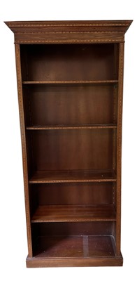 Lot 1269 - Edwardian style inlaid open bookcase with moulded cornice, four adjustable shelves, on plinth base