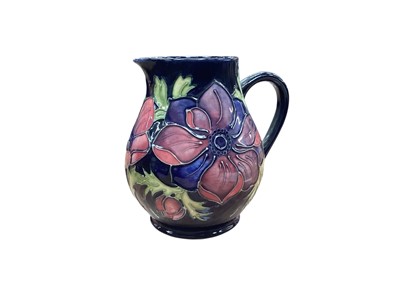 Lot 1014 - Moorcroft pottery jug decorated in the Anemone pattern, 14.5cm high