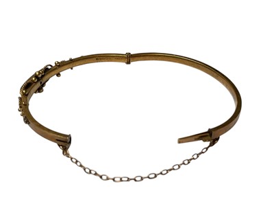 Lot 224 - Edwardian 15ct gold diamond three stone hinged bangle with applied ropetwist and ball decoration (Birmingham 1902)