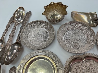Lot 136 - Collection of Indian and Middle Eastern silver and white metal items to include pin dishes, ashtray, napkin rings and other items.