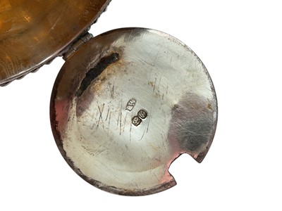 Lot 137 - Early Victorian silver mustard pot of drum form with gadrooned border, reeded angular handle and interior with blue glass liner, (London 1838), 5.1cm in overall height.