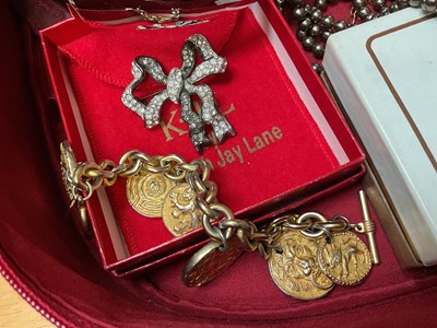 Lot 145 - Kenneth Lane paste set bow brooch in box, Alexis Kirk silvered articulated cuff choker necklace and two belts with dust bags, Agatha gilt metal necklace, bracelet and pair of matching earrings,...