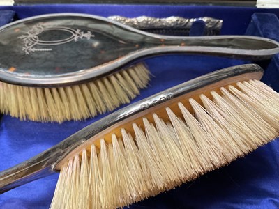 Lot 147 - 1920s silver and tortoiseshell five piece dressing table set in fitted case