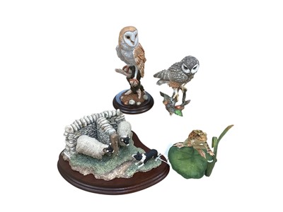 Lot 1067 - Border Fine Arts sculpture of two rams and a dog, signed Ray Ayers 4th September 1992, together with two owls and a frog (4)