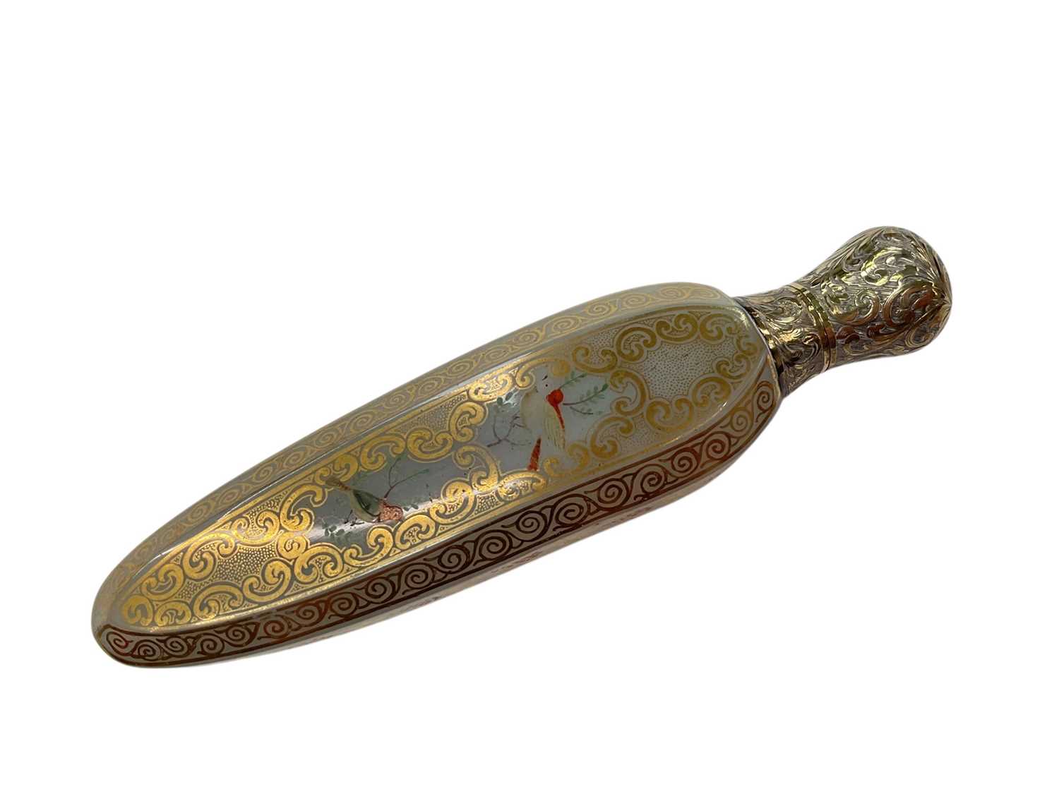 Lot 194 - Good quality 19th century Continental opalescent glass scent bottle with gilded decoration and gilded white metal mount with engraved decoration, 13cm in overall length.