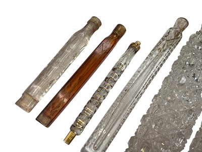 Lot 195 - Four Victorian and later cut glass scent bottles with silver mounts (various dates and makers), together with four continental glass scent bottles (8).