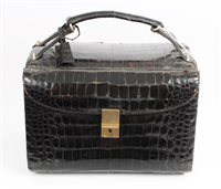 Lot 3114 - Vintage Loewe black crocodile skin travelling...