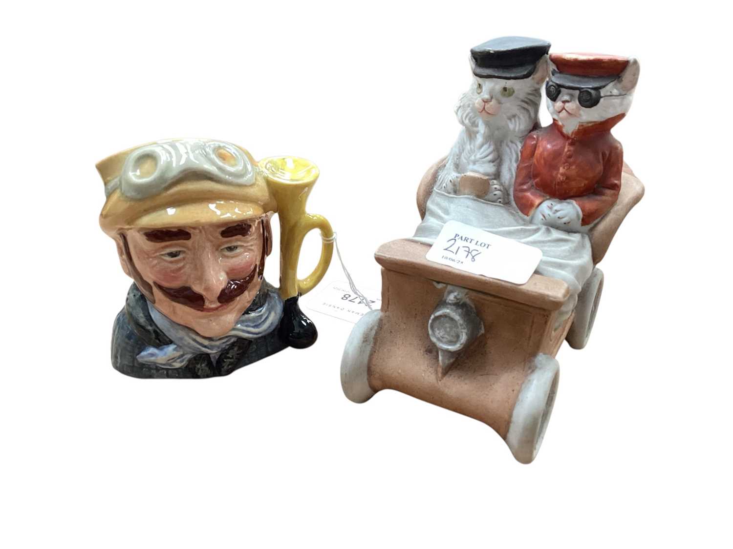 Lot 2178 - Unusual early 20th century continental bisque porcelain trinket box "Monsieur et Madam Pussy" modelled as two cats driving an Edwardian car. N.B. See page 155, The Motor Car in Art by John J. Zo...