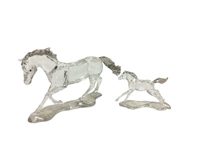 Lot 1077 - Swarovski Crystal annual edition 2014 - Horse Esperanza with plaque, together with companion foal, both boxed
