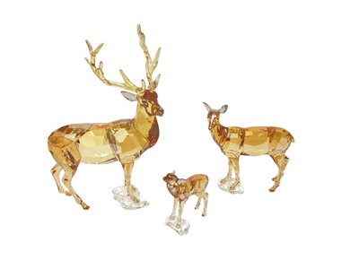 Lot 1079 - Swarovski Crystal annual edition 2020 - Stag Alexander, together with doe and fawn, all boxed