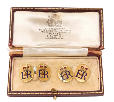 Lot 46 - H.M. Queen Elizabeth II, fine pair Presentation 9ct gold and polychrome enamel cufflinks , each oval decorated with crowned ERII cypher, joined by chains in original red leather box with gilt em...