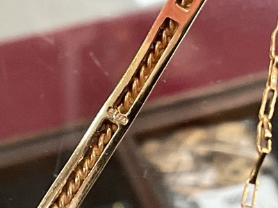 Lot 205 - 9ct gold emerald and diamond hinged bangle (one stone missing)