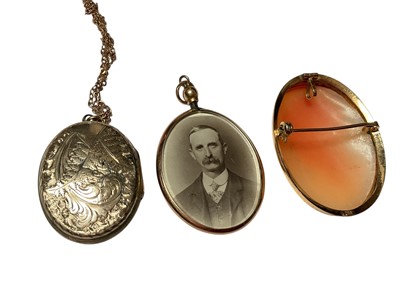 Lot 209 - Two 9ct gold chains, 9ct gold mounted cameo brooch, Victorian enamelled locket on 9ct gold chain and gold mounted glazed locket