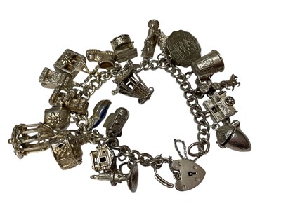 Lot 210 - Silver charm bracelet with padlock clasp, together with a small group of costume jewellery
