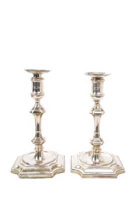 Lot 575 - Pair of Edwardian silver candlesticks