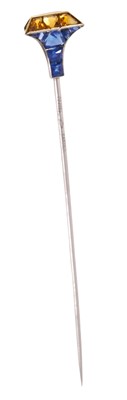 Lot 725 - Cartier blue sapphire and citrine stick pin