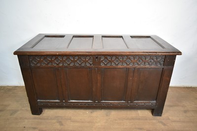 Lot 1522 - 18th century oak coffer, four panel rising top and front with carved geometric frieze, on block feet