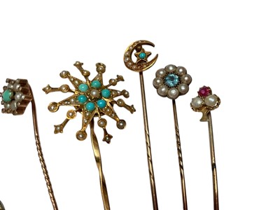 Lot 230 - Collection of nine Victorian and Edwardian gold and yellow metal seed pearl and gem set stick pins