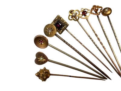 Lot 231 - Collection of nine Victorian and Edwardian gold and yellow metal gem set stick pins