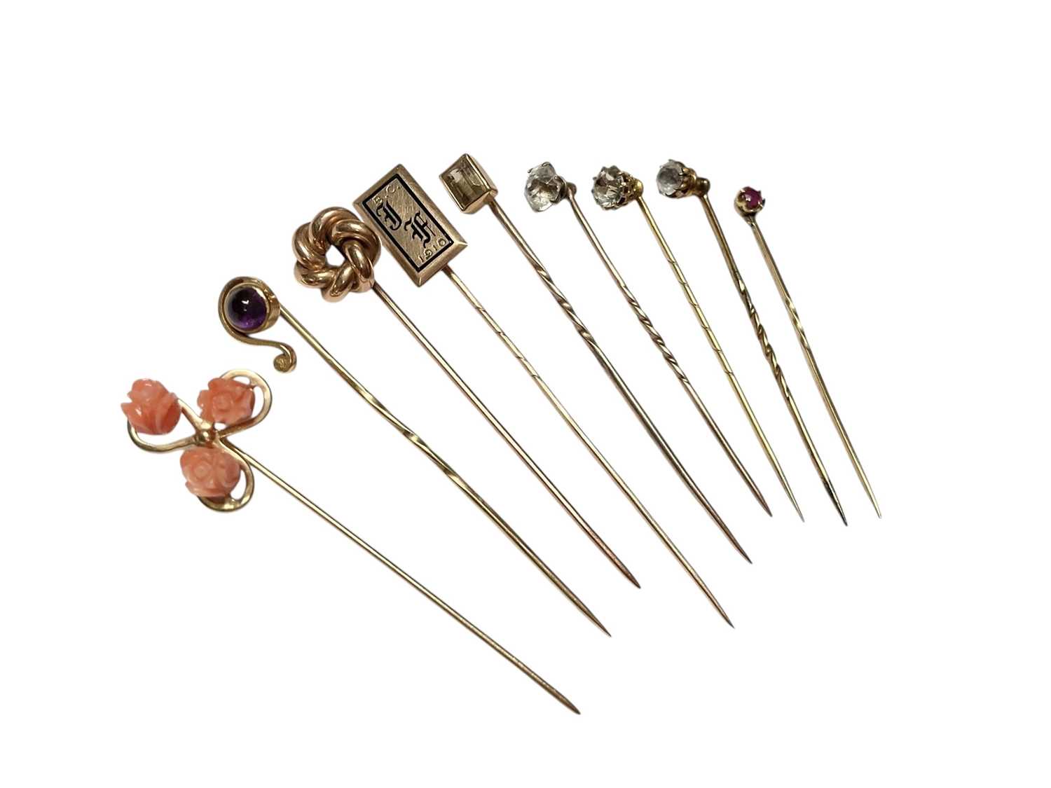 Lot 232 - Collection of nine Victorian and Edwardian gold and yellow metal gem set stick pins