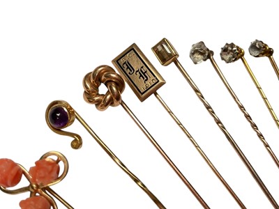 Lot 232 - Collection of nine Victorian and Edwardian gold and yellow metal gem set stick pins